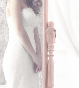 Bride looking into the mirror